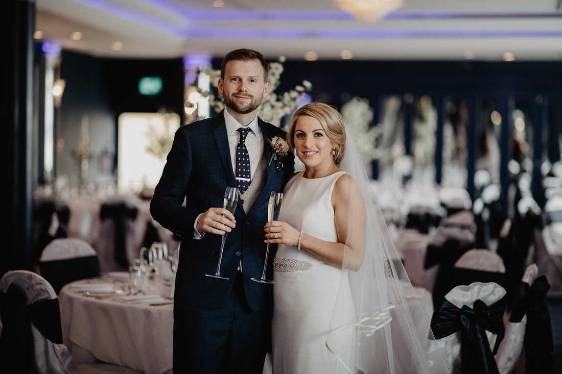 Bride and groom in a function room at the G Hotel and Spa, Galway