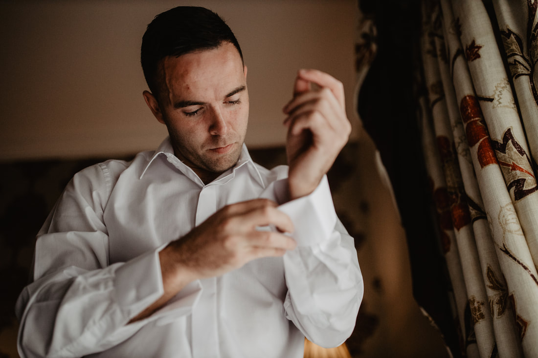 Groom is getting ready, at Clanard Court Hotel, Athy, Co. Kildare by wedding photographer Mario Vaitkus