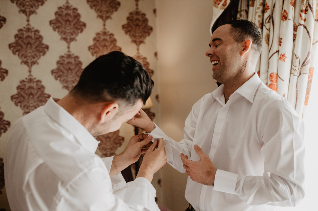 groom and best man getting ready for a wedding, at Clanard Court Hotel, Athy, Co. Kildare by wedding photographer Mario Vaitkus