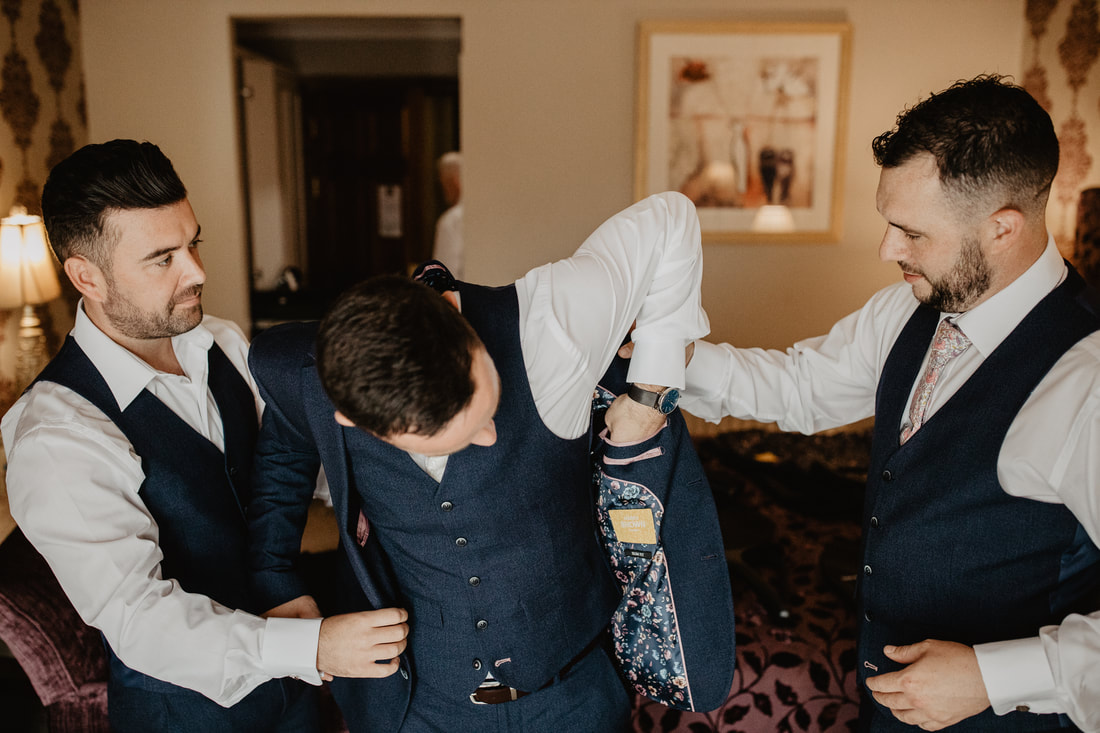 Getting ready, groomsmen at Clanard Court Hotel, Athy, Co. Kildare by wedding photographer Mario Vaitkus