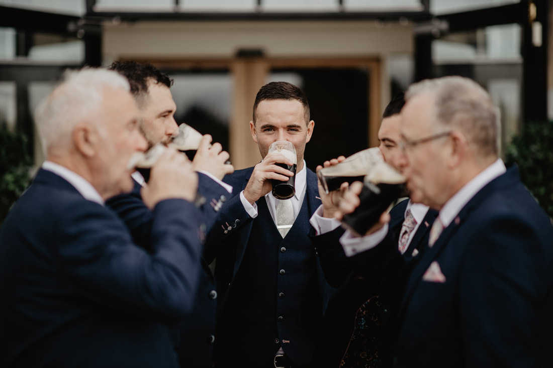 Groom and Guinness at Clanard Court Hotel, Athy, Co. Kildare by wedding photographer Mario Vaitkus