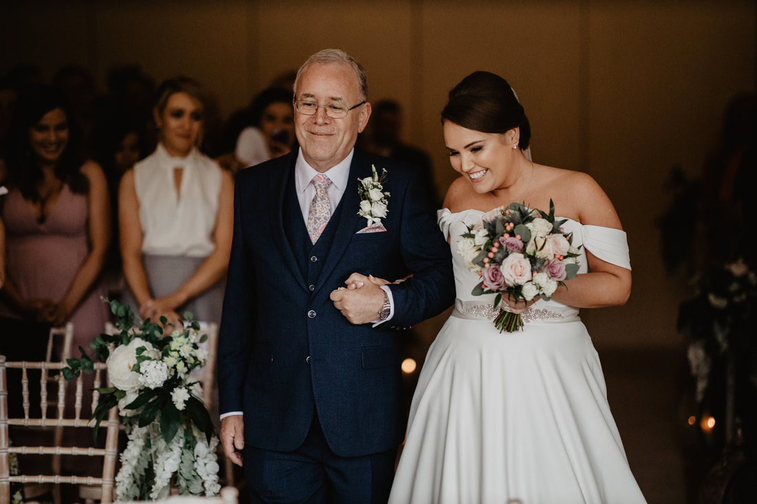 Bride and father down the aisle at Clanard Court Hotel, Athy, Co. Kildare by wedding photographer Mario Vaitkus