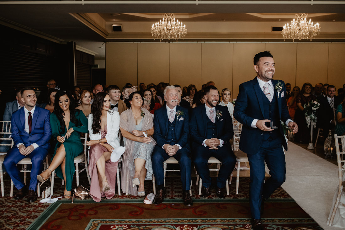 Wedding ceremony, best man brings the rings at Clanard Court Hotel, Athy, Co. Kildare by wedding photographer Mario Vaitkus