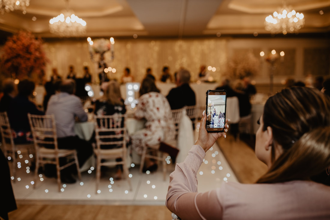 Mobile phone photography at a wedding. Wedding photographer in County Kildare Mario Vaitkus