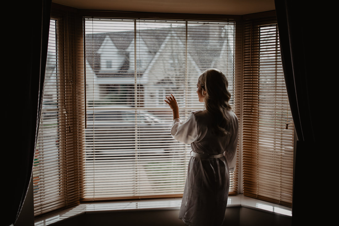 Bride at a window, Mallow, Co. Cork