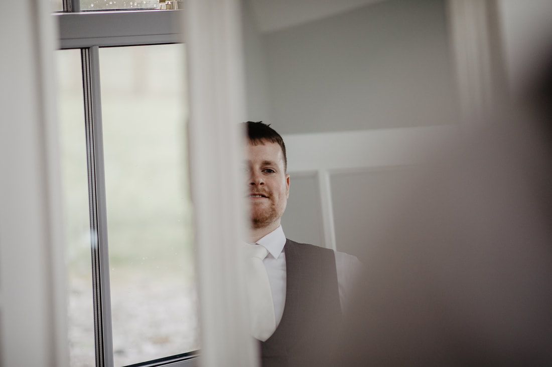 Groom reflection in a mirror, Mallow wedding