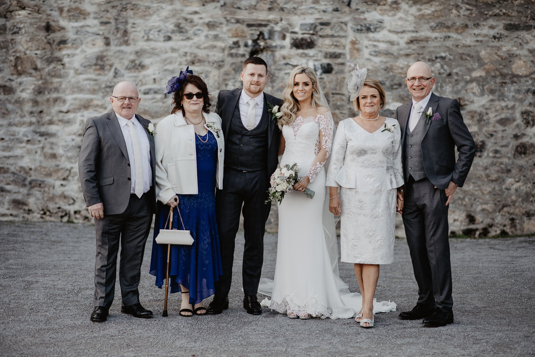 Wedding family portrait at Ross Castle, Killarney, Co.Kerry by talented photographer Mario Vaitkus