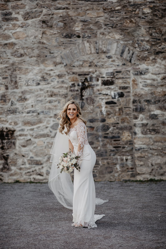 Beautiful bride posing Ross Castle, Killarney, Co.Kerry