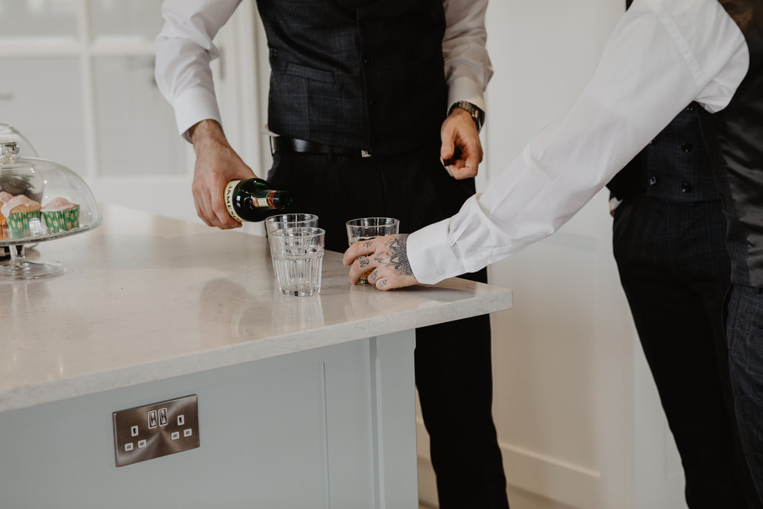 Jameson whiskey to cool down nerves before getting married. Wedding in Mallow, by photographer Mario