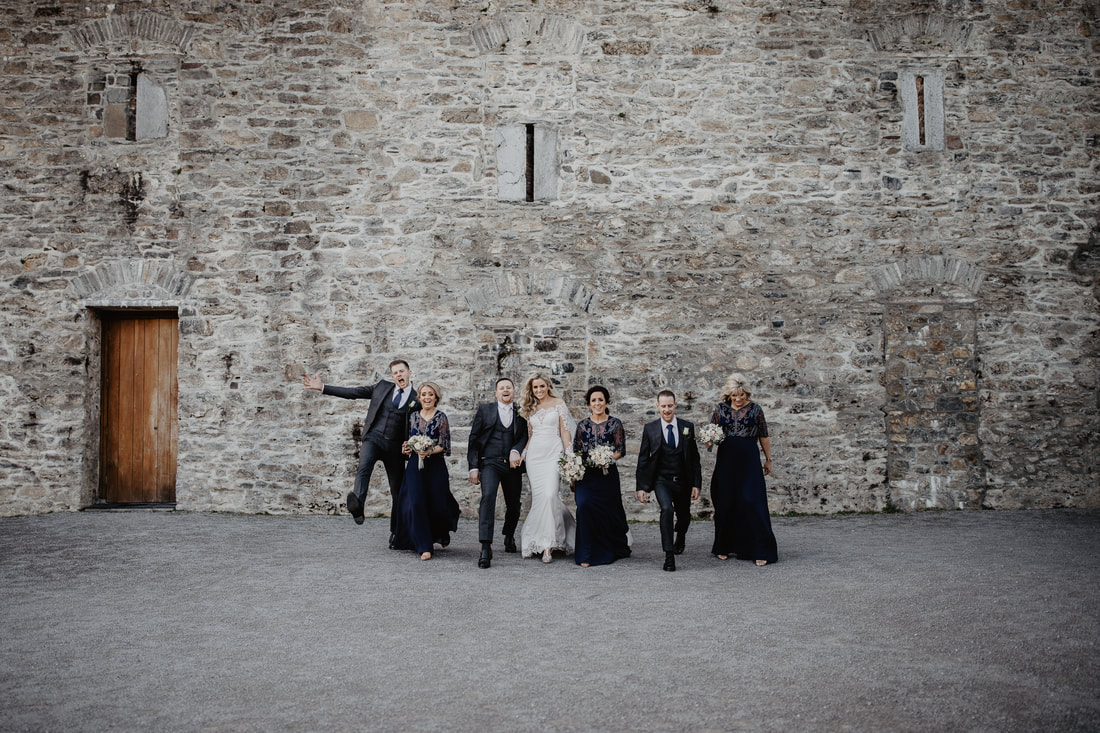 Bridal party at Ross Castle in Killarney. Wedding Photographer Mario Photo - Video Production