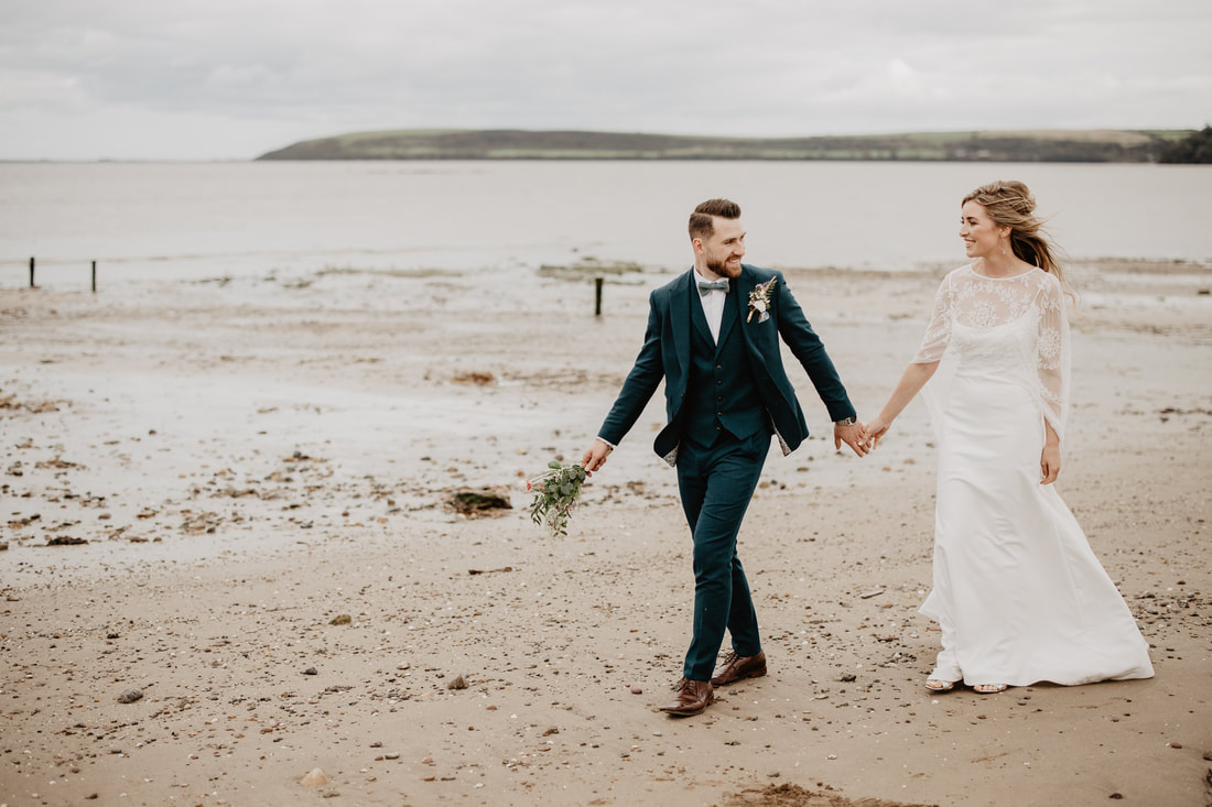 Bride and groom on a beach