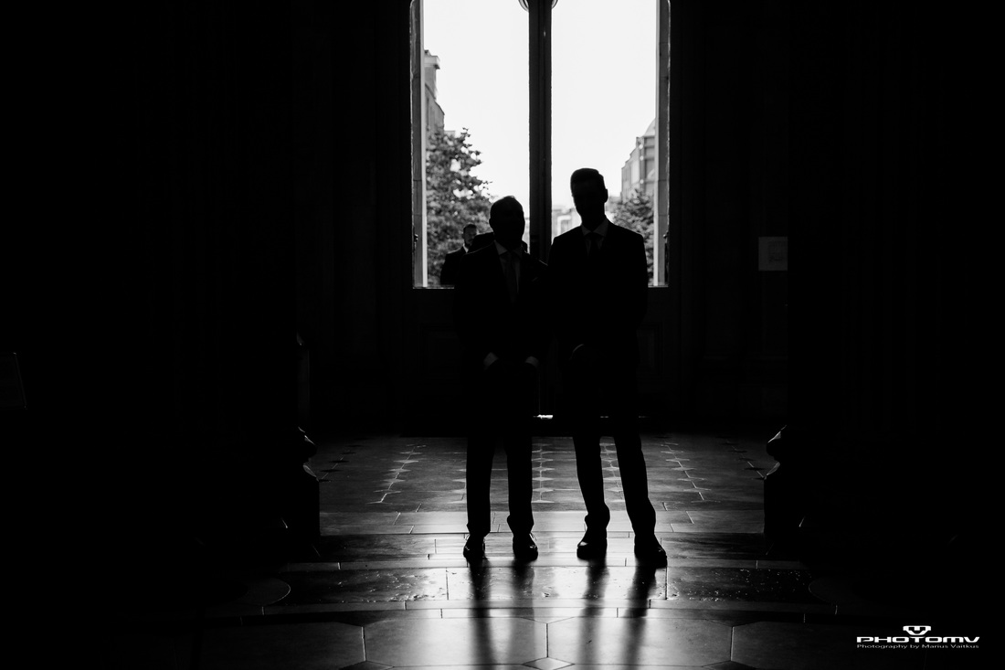 Silhouette of gay couple at their wedding