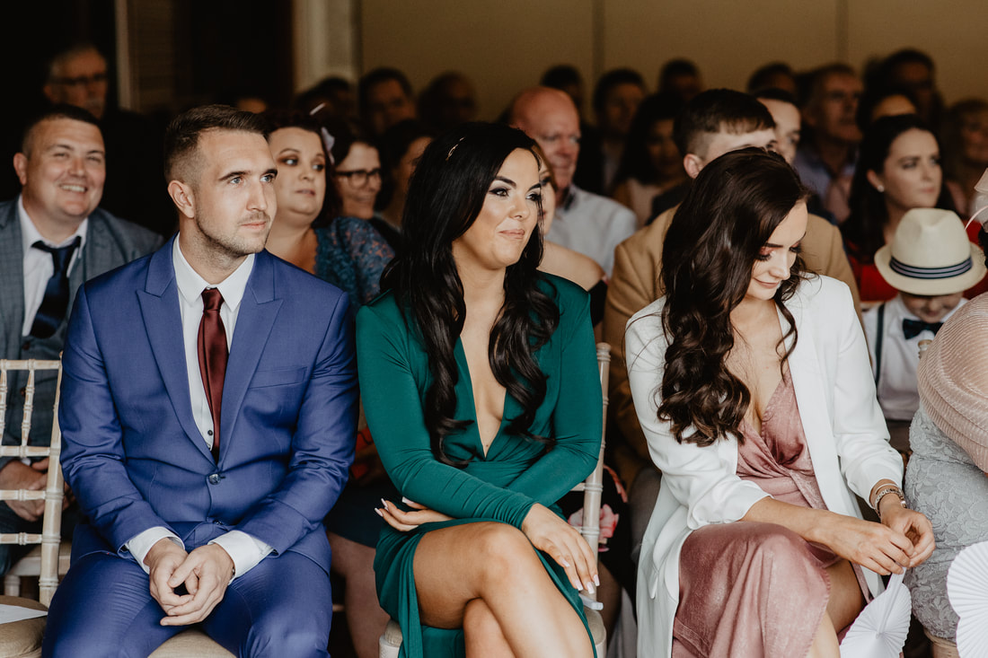 Candid wedding photography. Guests at Clanard Court Hotel, Athy, Co. Kildare by wedding photographer Mario Vaitkus